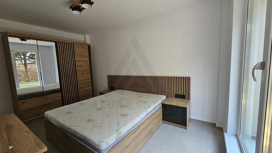 Apartament modern 49.7 mp utili 2 camere si curte 50 mp in Da Vinci