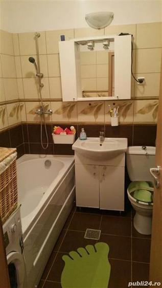 Decomandat cu 2 bai si 2 balcoane cu garaj sub bloc
