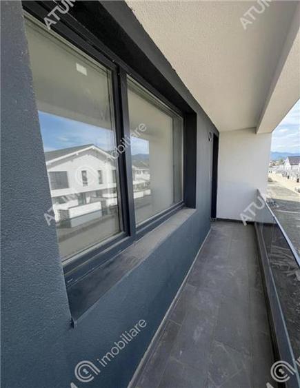 Casa cu 4 camere 2 bai curte de 50 mp zona Calea Cisnadiei Sibiu