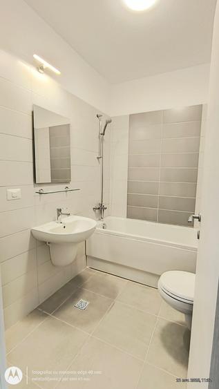 Apartament cu 3 camere, 2 bai si loc de parcare