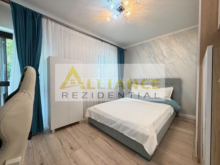 Casa P+1+M cu teren de 650 mp, piscina si curte complet amenajata