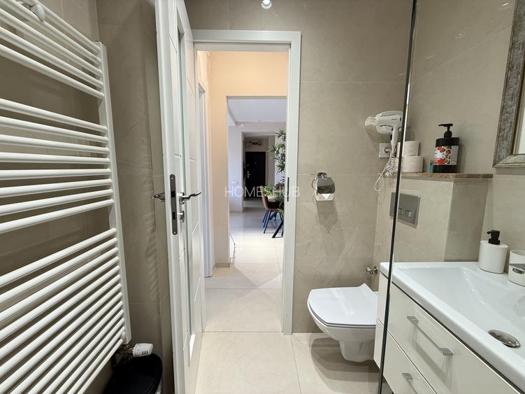 Unicat în Piața Romană! 2 camere, 53 mp, renovat integral cu designer - 12