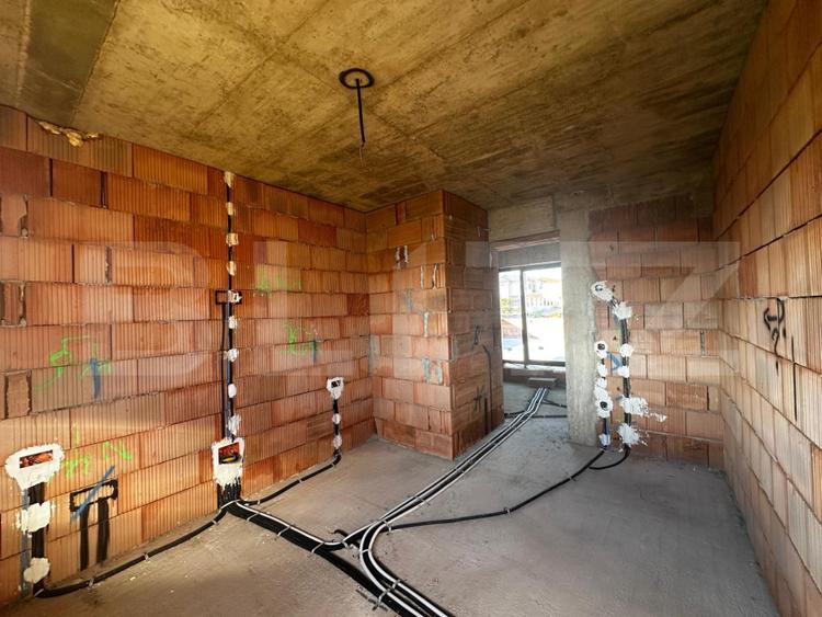 Casă cu terasă panoramică și proiect premium în Corușu