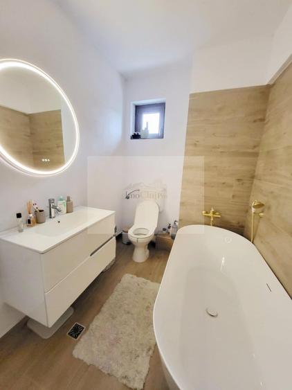 Apartament modern cu 3 camere | 2 băi - parcare | Locație excelentă