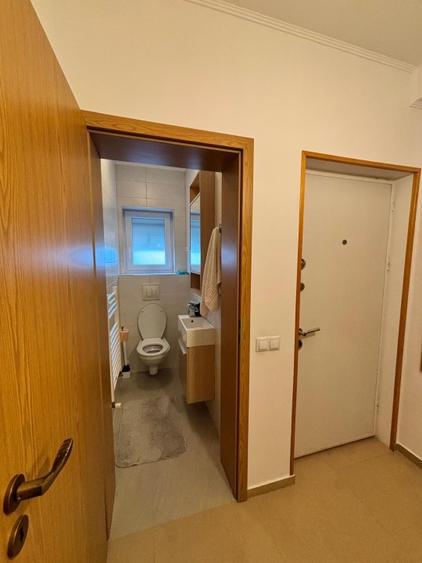 Apartament tip vila cu curte,2 camere,2 bai , loc parcare