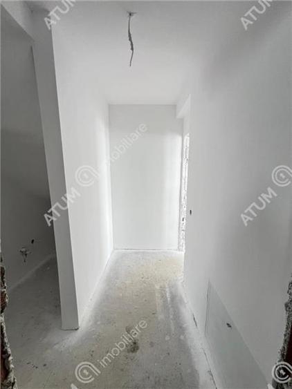 Casa cu 4 camere 2 bai curte de 50 mp zona Calea Cisnadiei Sibiu