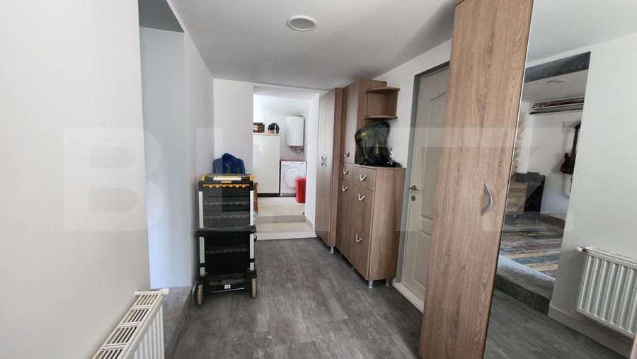 Casa cu 3 camere, 2 bucatarii, Teren de 1000 mp, zona Unirii
