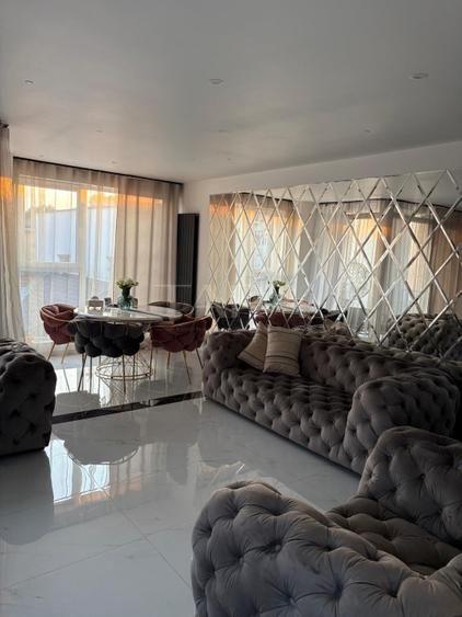 Apartament 2 camere, terasă, 2 parcari subterane, zonă centrală.