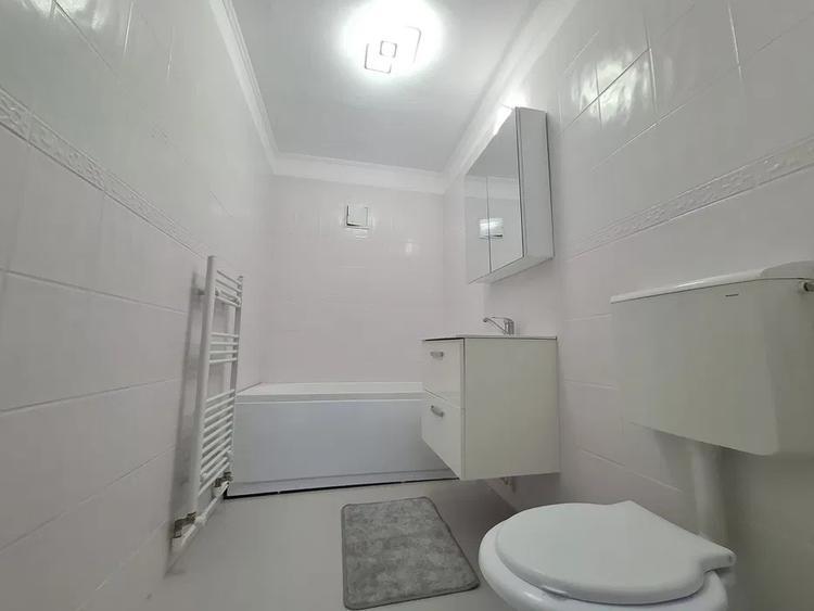 Apartament 2 camere, decomandat, 56 mp, centrala, ac, zona Casa de Cultura