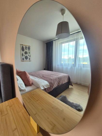 Apartamente în vilă construite în 2024, cu priveliște spre Postăvaru.