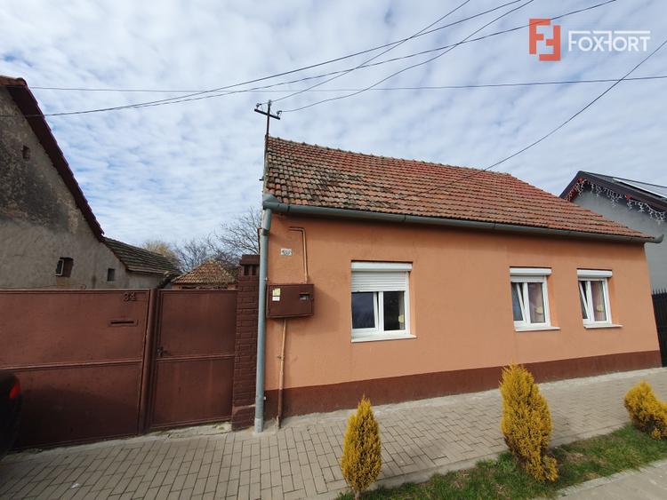 Casa de vanzare cu 3 camere si teren de 1008 mp - Deta