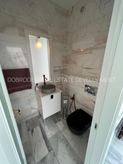 Penthouse mobilat lux , vedere frontală la mare - 19