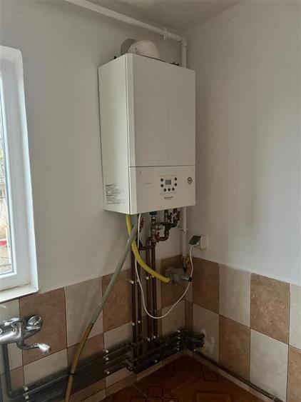 Casa individuala cu panouri solare si centrala pe gaz Parta