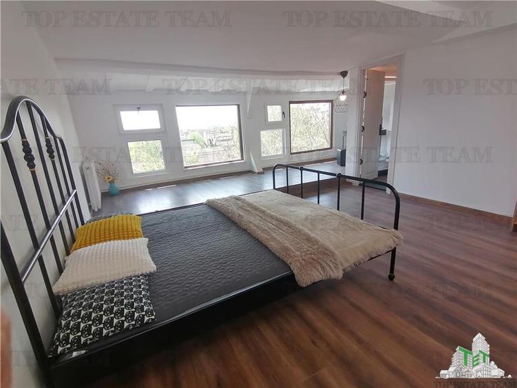 Apartament mansardabil de vanzare