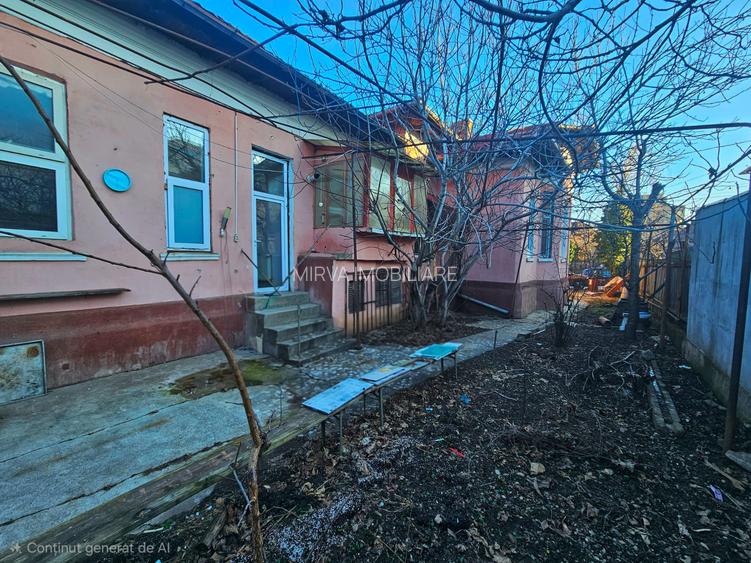 Casă cu arhitectură interbelică, 5 camere, teren 409 mp – Central - 57