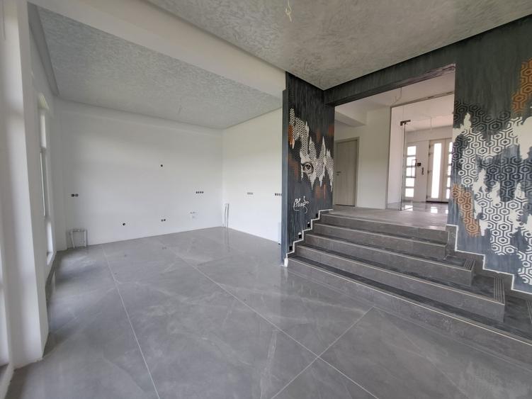 Vilă modernă premium cu piscină interioară, teren 1200 mp și panoramă