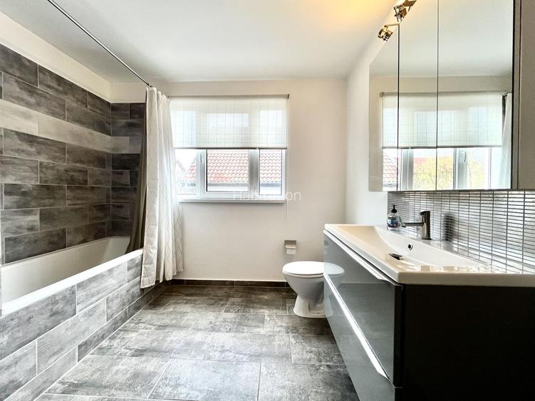 Casă luminoasă cu curte și garaj, perfectă pentru familie | Braytim - 60