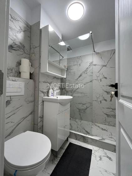 Apartament renovat cu balcon și vedere – Piața Victoriei - 8