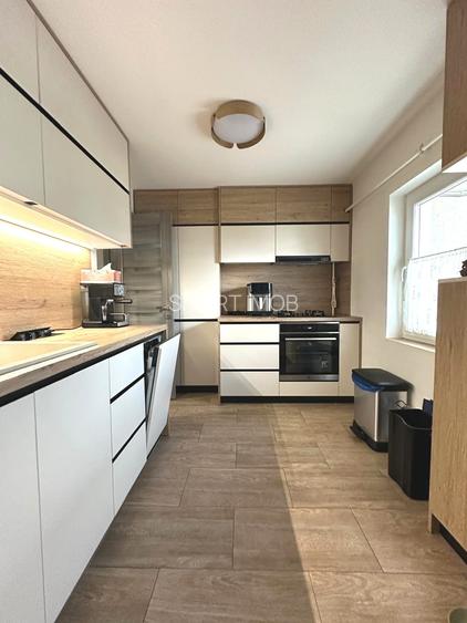 Apartament 4 camere+garaj sub bloc finisat mobilat 129.000eur neg - 2