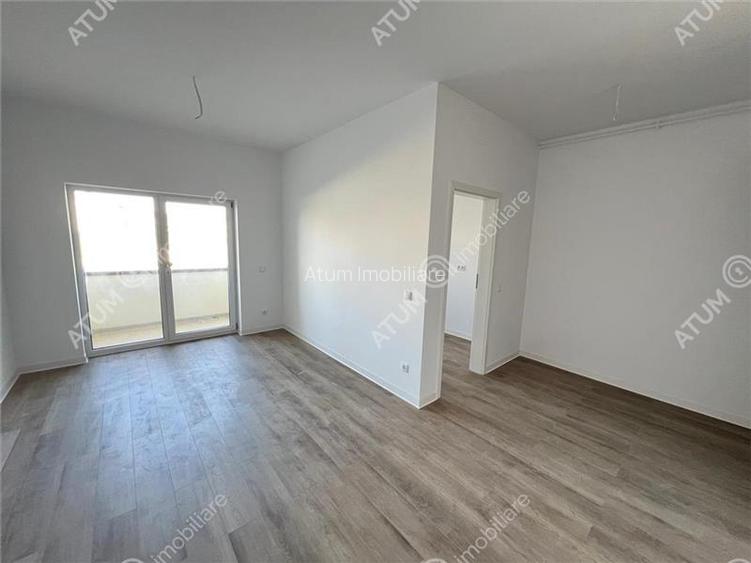 Garsoniera cu balcon si parcare de vanzare in Selimbar zona Brana - 18