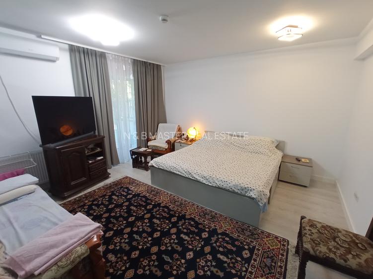 Garsoniera parter +25mp curte - 3