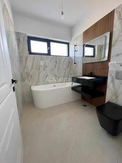 Comuna Berceni - Casa individuala 4 camere - Teren 407 mp - Finalizata - 26