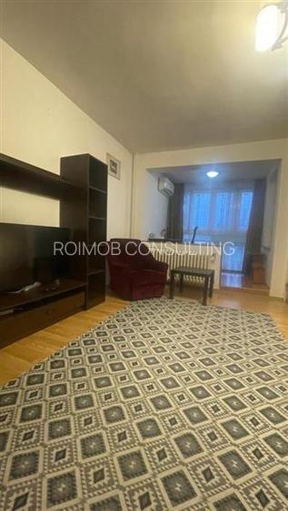 Dristor, garsoniera luminoasa in bloc mixt - 2