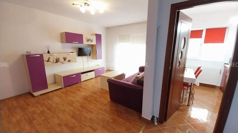 Inchiriere apartament decomandat 2 camere, parcare, et.1 str.Florilor Floresti - 10