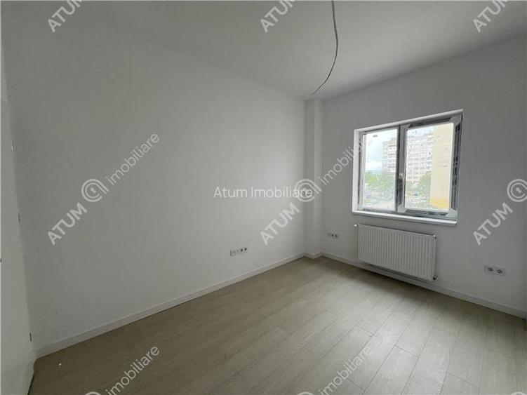 Apartament de 3 camere cu 2 bai etaj intermediar zona Rahovei - 4