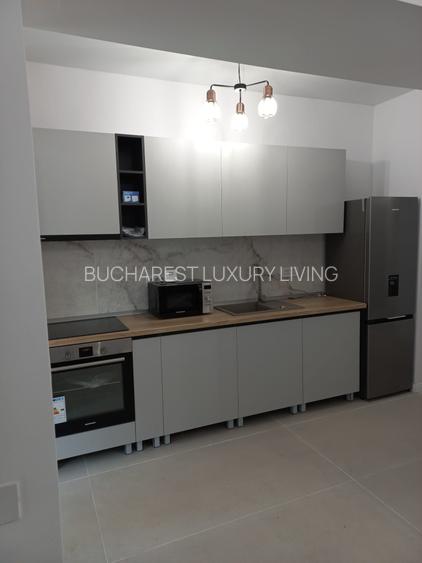 PACHET 14 APARTAMENTE PLUS UN STUDIO SI 10 LOCURI DE PARCARE - 4