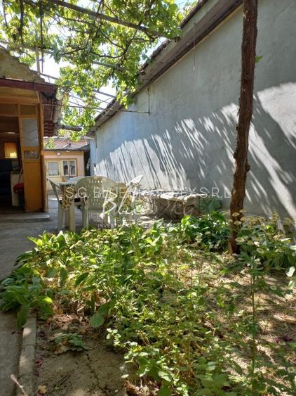  Casa batraneasca  cu teren de 435mp cu utilitati si deschidere 14 m- Coiciu  - 5