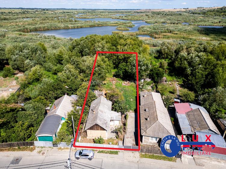 ID 7854 EXCLUSIVITATE – Teren cu casă și ieșire la canal - 2