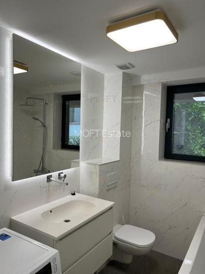 Apartament boutique cu grădină 150 mp – 217.6 mp utili | Sector 4 | Bloc nou - 12