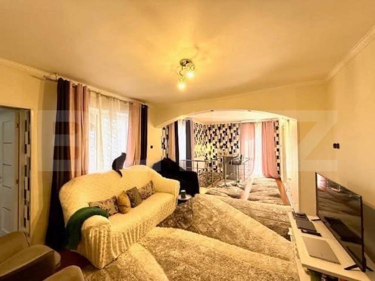 Casă cu 5 camere și un teren de 700 mp