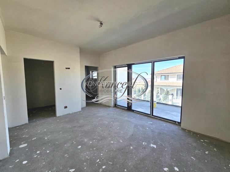 Locuinta moderna cu design cubic si curte plana in Dezmir - 10