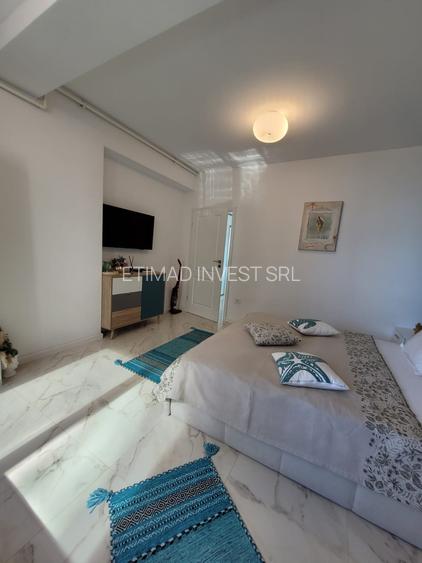 2 camere -vedere frontala mare +loc parcare subteran -termen lung(inclusiv vara) - 38