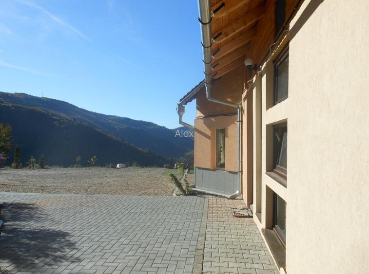 Complex turistic în Munții Apuseni–3 clădiri(cabane), 10 camere, teren 3740 mp  - 10