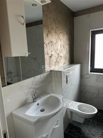 Duplex spatios - bucatarie inchisa - zona linistita - teren 375 mp - 16