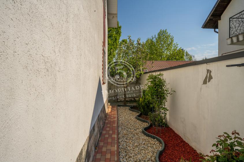 Casa cu probabil cea mai frumoasă grădină din Bragadiru + 2 garaje - 34