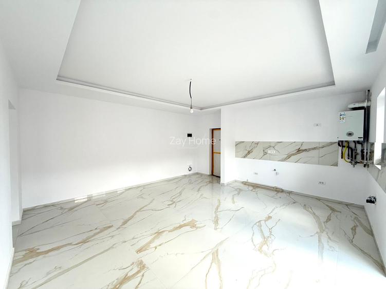 Disponibil imediat. Drum asfaltat. 2 locuri de parcare acoperite. - 2