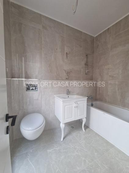 Decebal - Unirii -  Bloc nou - Apartament 3 camere - terasa - 2 grupuri sanitare - 17