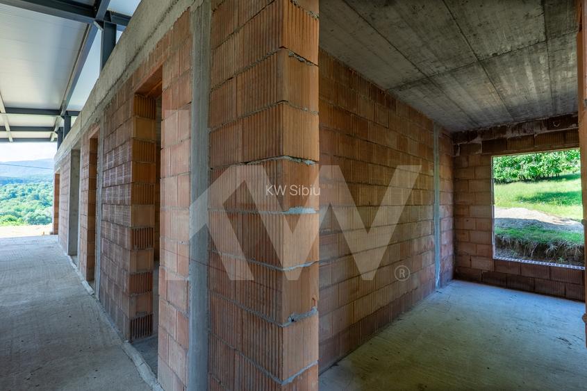 Casă cu arhitectură modernă si teren  in Cisnădioara - 15