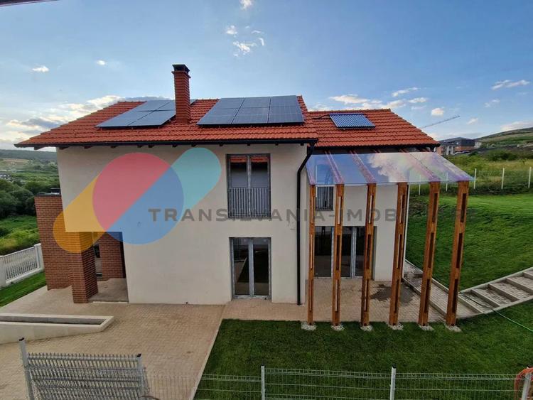 Casa de vanzare 128mp + 514mp teren - Chinteni