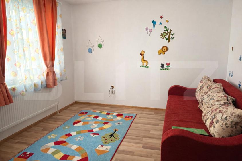 Casa individuala moderna cu panouri fotovoltaice, 600mp teren, 5 camere si garaj