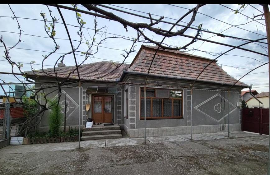 Casa cu teren de vanzare
