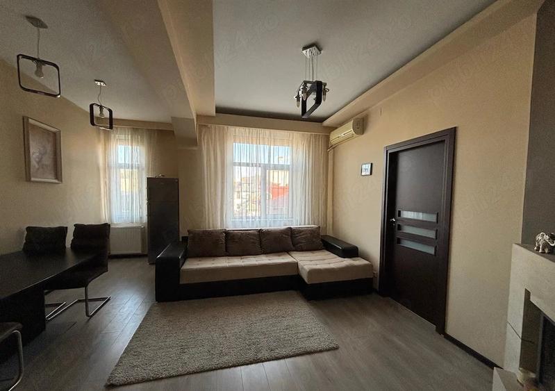 Apartament de 3 camere, 74 mp, parcare, centrala, șemineu pe lemne, zona Domenii