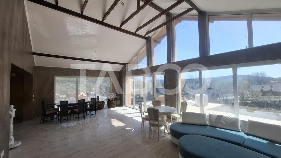Casa de vanzare 405 mp utili 2 garaje 250 mp terase Slimnic Sibiu