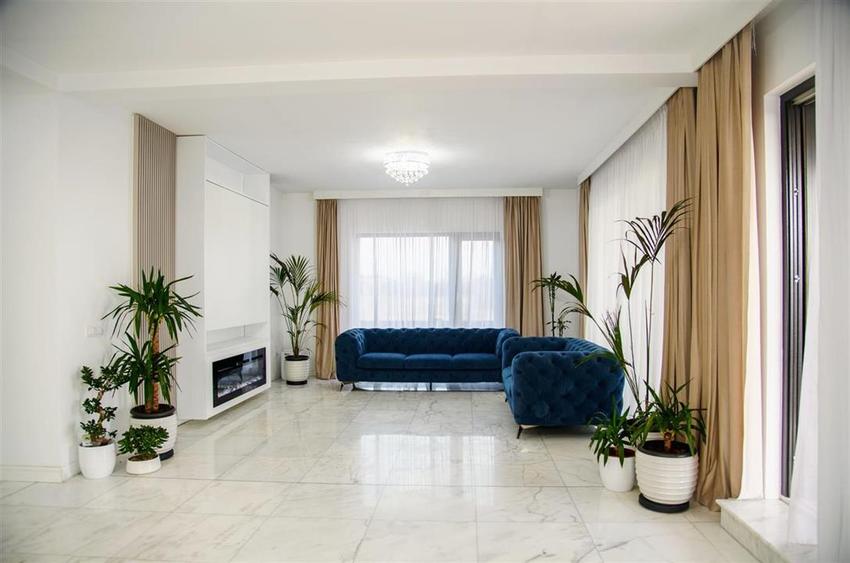 Casa intr-o zona linistita cu garaj si teren-1091 mp