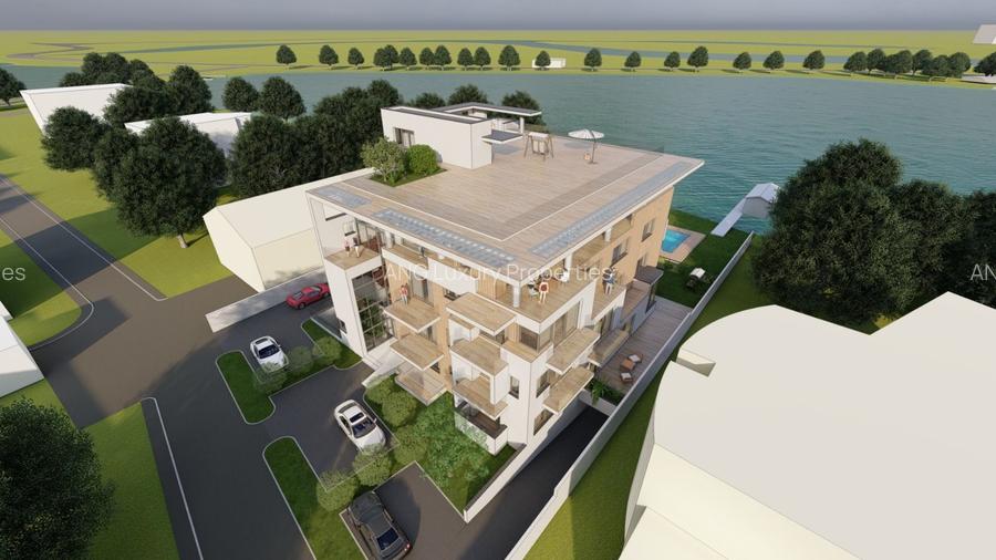 TEREN INTRAVILAN PE MALUL LACULUI, CU AUTORIZATIE - 2