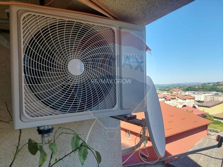 Apartament cu 4 camere decomandat de vânzare în Moinesti - 10